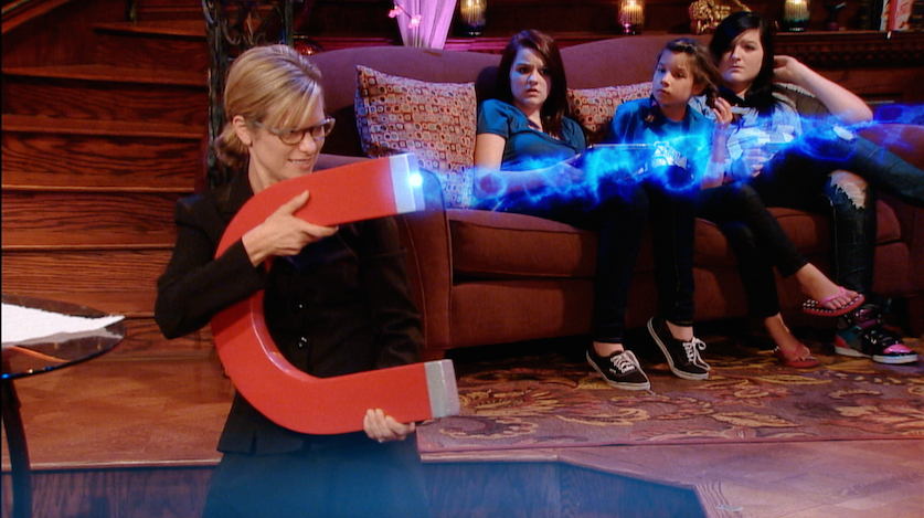 TV show scene with magnet and blue visual effects